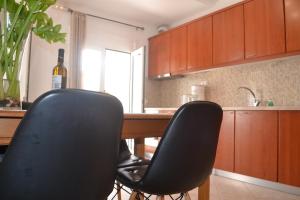 Kuchyň nebo kuchyňský kout v ubytování Bali House