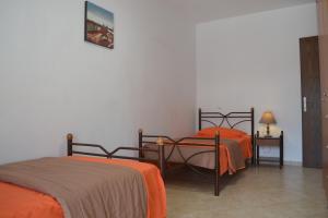 Postel nebo postele na pokoji v ubytování Bali House