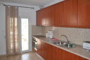Kuchyň nebo kuchyňský kout v ubytování Bali House