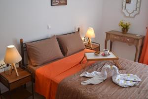 Postel nebo postele na pokoji v ubytování Bali House