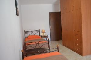 Postel nebo postele na pokoji v ubytování Bali House