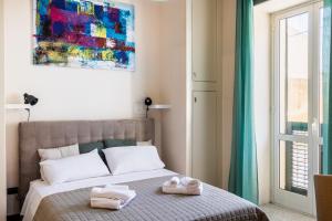 Voodi või voodid majutusasutuse Guest House Aurispa toas