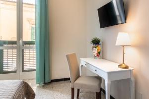 Televiisor ja/või meelelahutuskeskus majutusasutuses Guest House Aurispa