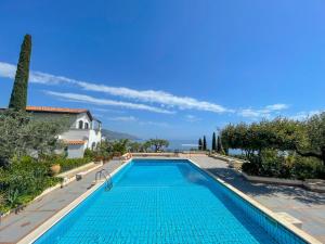 Bazén v ubytování Residence Terra Rossa Taormina nebo v jeho okolí