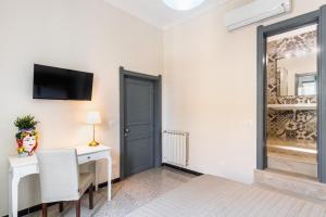 TV a/nebo společenská místnost v ubytování Guest House Aurispa