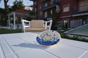 a bowl sitting on top of a table at Giardino Archeologico in Sorrento