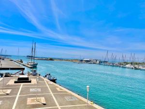 a view of a marina with boats in the water at LE PANORAMIQUE cap d’agde in Cap d'Agde