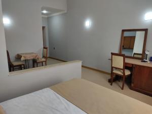Postel nebo postele na pokoji v ubytování Shindan Hotel Astara