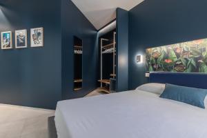 เตียงในห้องที่ Taormina Town - Guesthouse Sicily