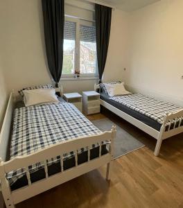 Voodi või voodid majutusasutuse Apartman Prima Sombor toas