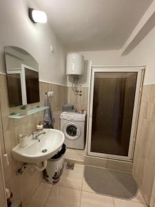 Vannituba majutusasutuses Apartman Prima Sombor