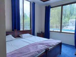 Postel nebo postele na pokoji v ubytování Geyari Resort Khaplu