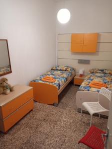 Posteľ alebo postele v izbe v ubytovaní Casa Gilè