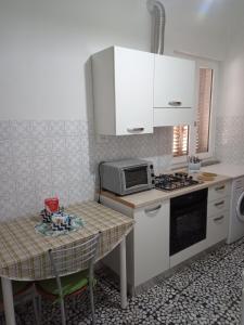 Kuchyňa alebo kuchynka v ubytovaní Casa Gilè + 13 fotografií