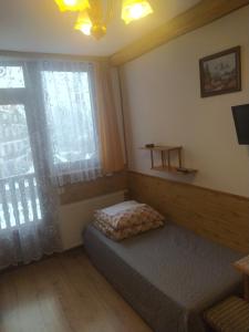 Posteľ alebo postele v izbe v ubytovaní Gackówka