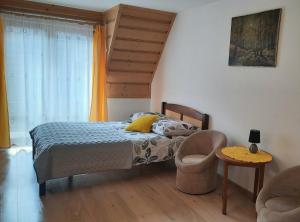 Posteľ alebo postele v izbe v ubytovaní Apartament dwupoziomowy u Samków