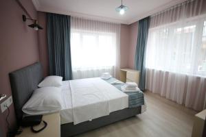 Krevet ili kreveti u jedinici u okviru objekta Stay Inn Edirne