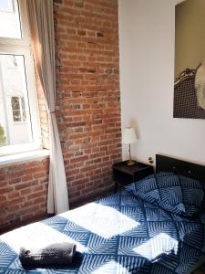 Posteľ alebo postele v izbe v ubytovaní Topolove Rooms & Apartments