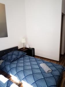 Posteľ alebo postele v izbe v ubytovaní Topolove Rooms & Apartments