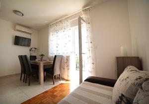 TV a/nebo společenská místnost v ubytování Apartments M&S