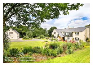 a house with a garden in front of it at Magnolia Cottage in Launceston