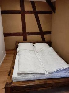 Krevet ili kreveti u jedinici u objektu Geschichte trifft Moderne - Fachwerkhaus Bacharach