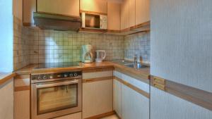 Kuchyňa alebo kuchynka v ubytovaní Ferienwohnung Adrowitzer + 12 fotografií