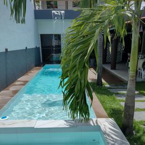 Foto dalla galleria di Casa encantadora com piscina prainha e SPA a João Pessoa