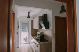 Kuchyňa alebo kuchynka v ubytovaní Apartman Garden