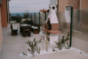 Balkón alebo terasa v ubytovaní Apartman Garden