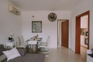 Posedenie v ubytovaní Apartman Garden