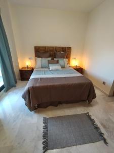 Posteľ alebo postele v izbe v ubytovaní Magnífico apartamento en El Pto de Sta María, aire acc, piscina, zona niños y padel