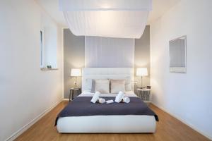 Postel nebo postele na pokoji v ubytování Kandlers street apartment