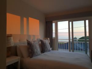 Letto o letti in una camera di The Cliff House Hotel
