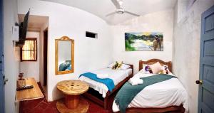 Un pat sau paturi într-o cameră la Casa Portales de Santa Bárbara