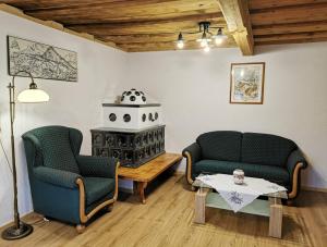 Posezení v ubytování Ferienhaus Rosl am Grundlsee