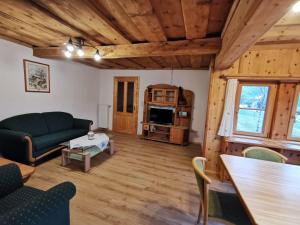 Posezení v ubytování Ferienhaus Rosl am Grundlsee