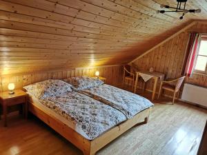 Postel nebo postele na pokoji v ubytování Ferienhaus Rosl am Grundlsee