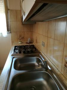 A kitchen or kitchenette at dreams on the sea