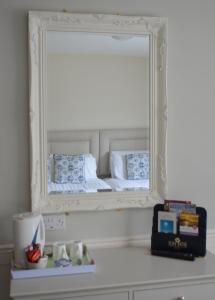 Letto o letti in una camera di The Cliff House Hotel