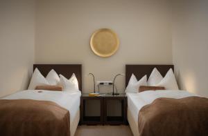 Łóżko lub łóżka w pokoju w obiekcie Hotel Post Wrann