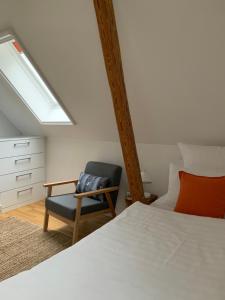 Ein Bett oder Betten in einem Zimmer der Unterkunft Ferienhaus Peerhus