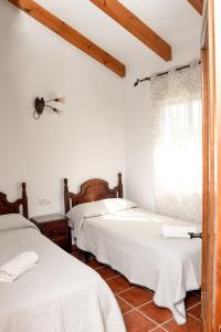 Postel nebo postele na pokoji v ubytování Casas Arena y Mar