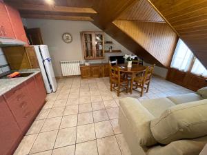 A kitchen or kitchenette at Hotel Apartamentos Barrau