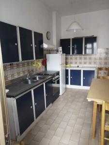 Kuchyňa alebo kuchynka v ubytovaní Appartamento Viareggio