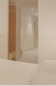 Postel nebo postele na pokoji v ubytování HOTEL LA FONDA B&B