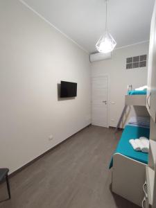 Posteľ alebo postele v izbe v ubytovaní Casa Violetta