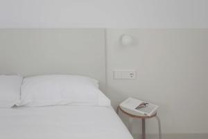 Postel nebo postele na pokoji v ubytování HOTEL LA FONDA B&B