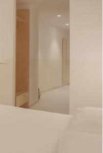 Postel nebo postele na pokoji v ubytování HOTEL LA FONDA B&B