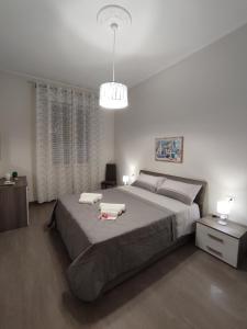 Posteľ alebo postele v izbe v ubytovaní Casa Violetta